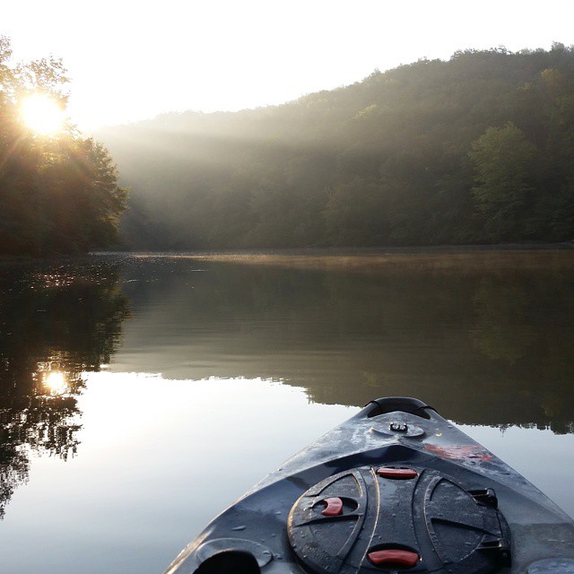 Boat on Flint River at sunset